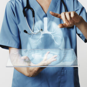 Doctors using transparent tablet with hologram medical technology